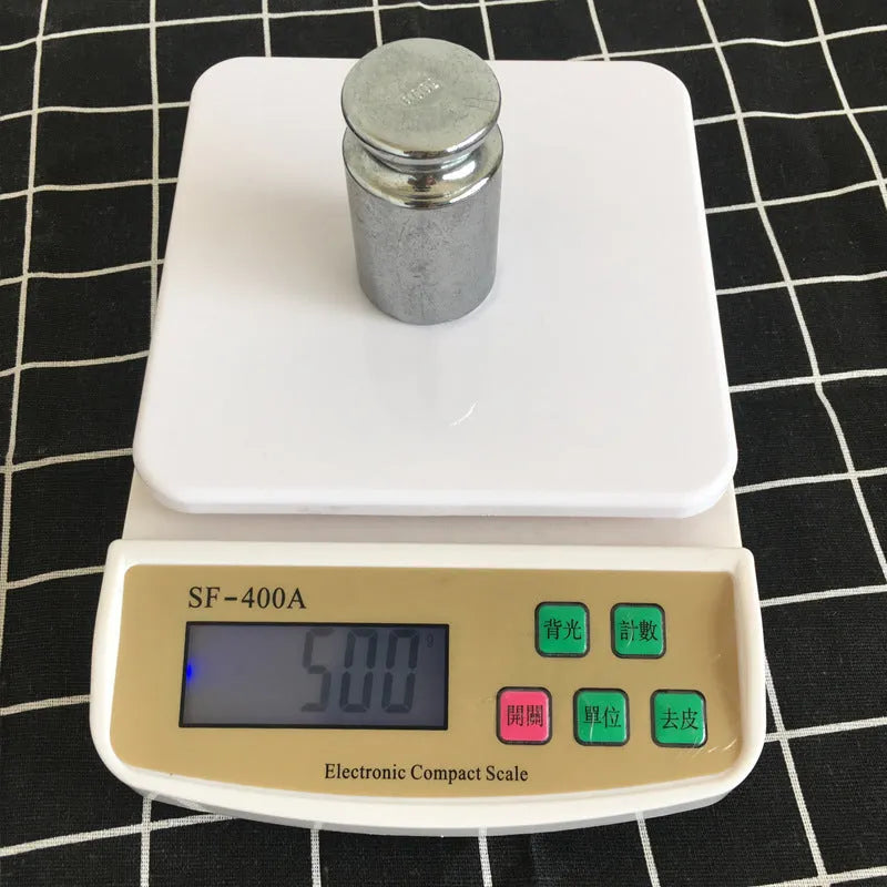 SF-400A digital kitchen scale with electronic display showing weight measurement