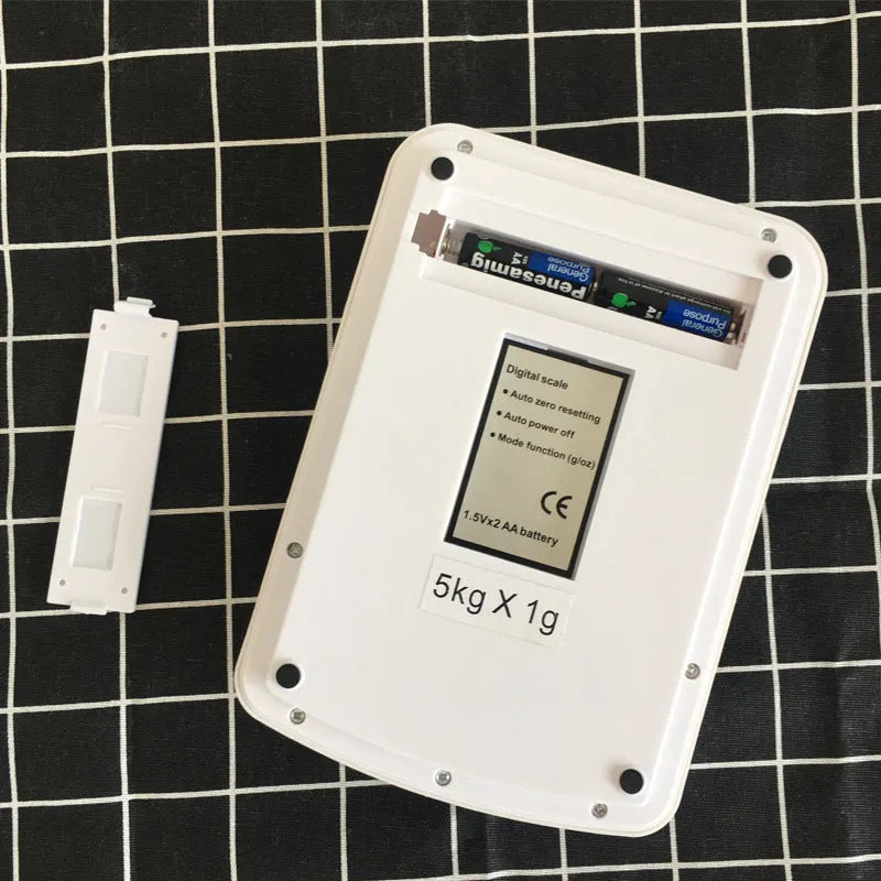 SF-400A digital kitchen scale with electronic display showing weight measurement