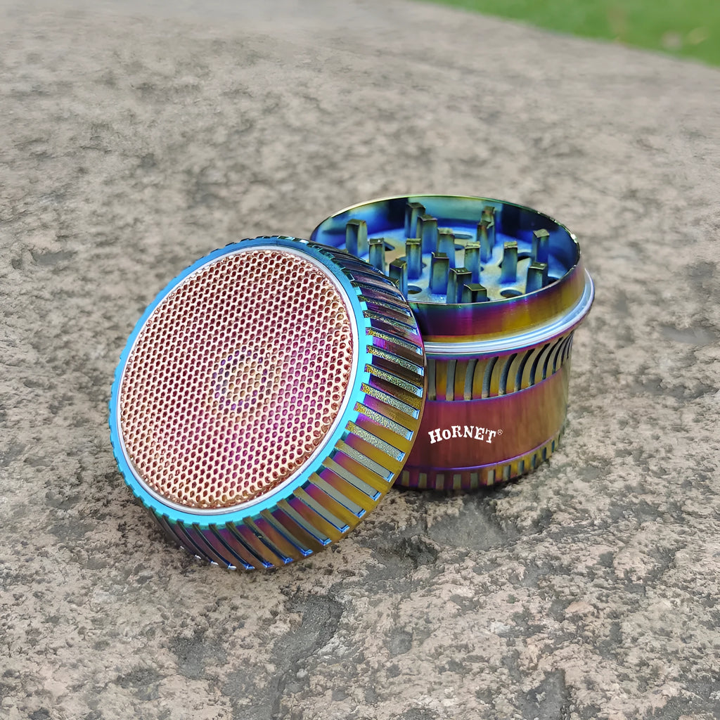 Creative mushroom-shaped zinc alloy metal smoke grinder with keychain and multi-functional tools on display