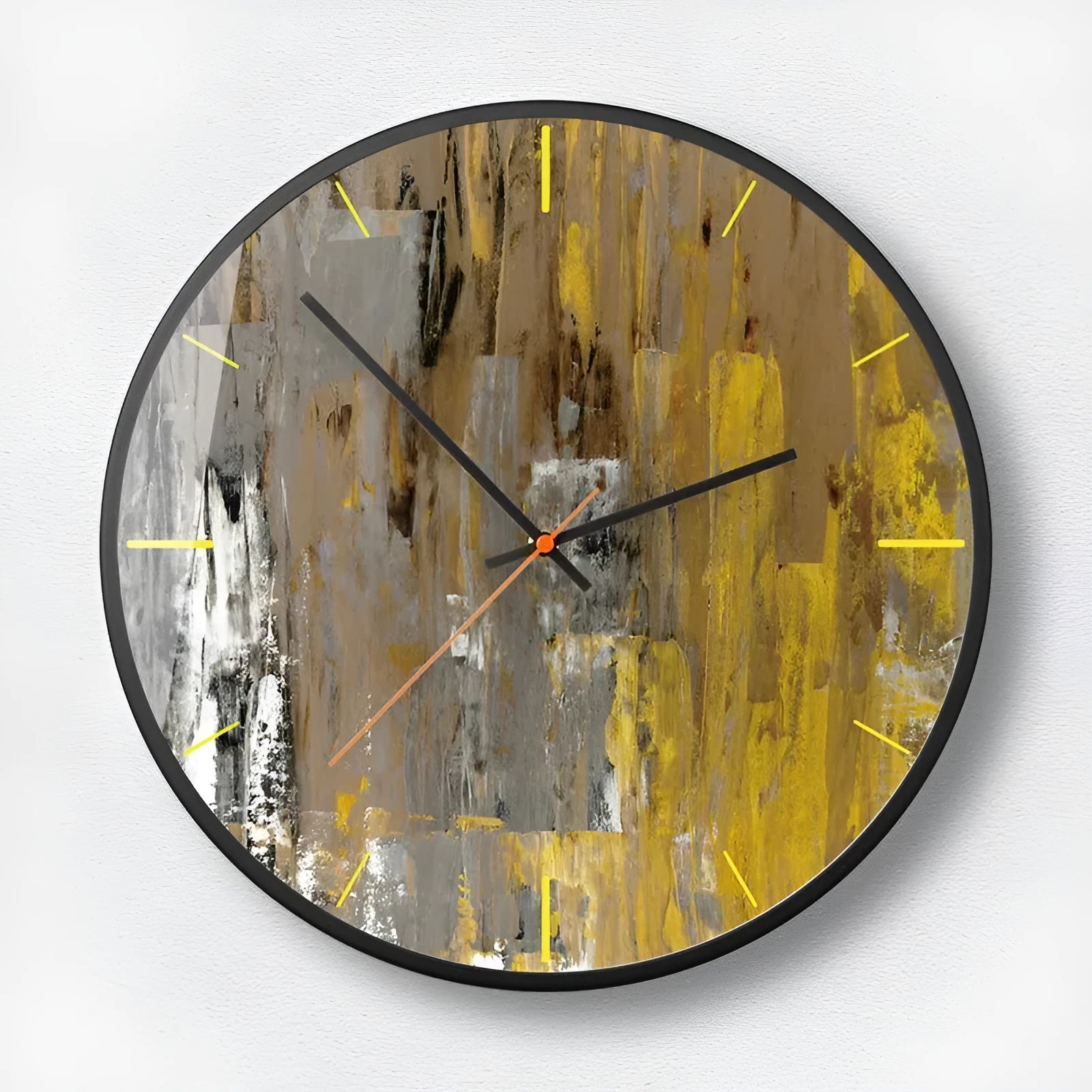 Round abstract art wall clock in black on a wall, showing hour and minute hands