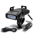 Rechargeable bicycle safety light in black, mounted on bike handlebars, with USB cable.