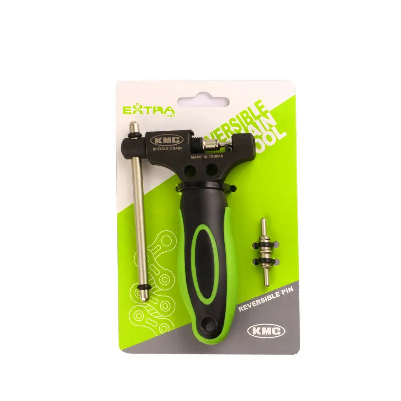 Green steel double-shaft bicycle chain rivet extractor tool on a white background.