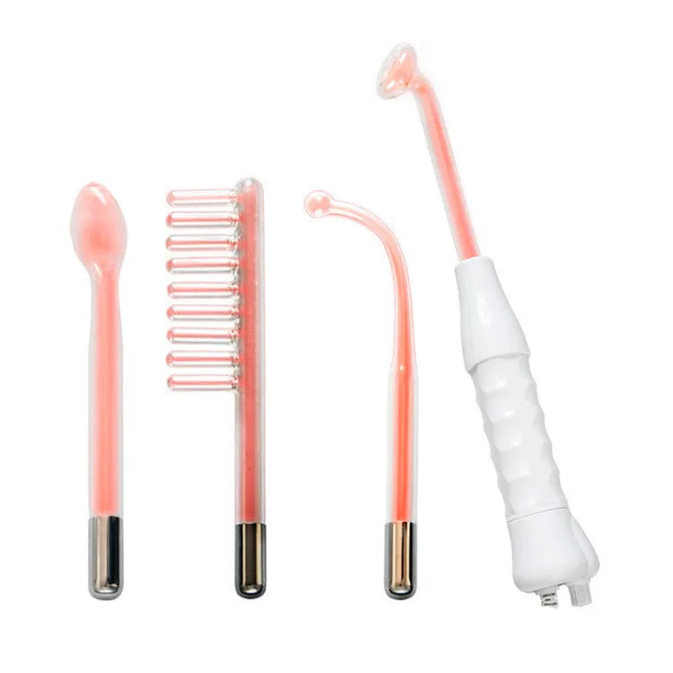 White high-frequency electrotherapy comb with four glass electrodes in packaging