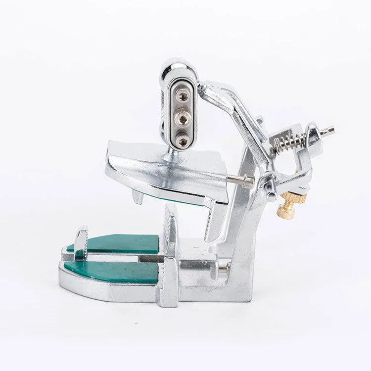 Korean style dental jaw articulator with adjustable settings on a laboratory bench