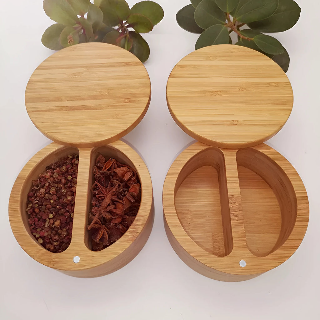 Bamboo seasoning box with a small spoon next to it on a kitchen countertop