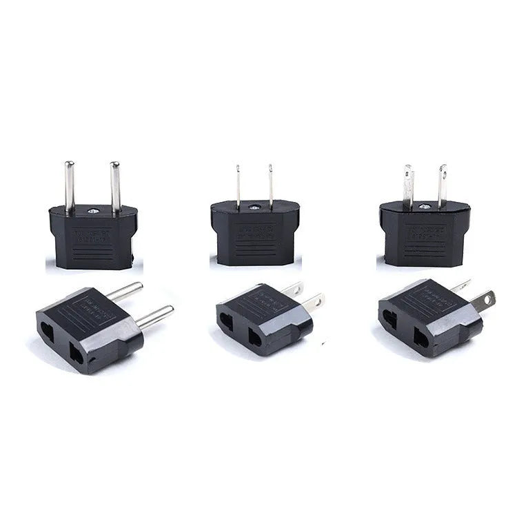 Compact black three-outlet travel plug converter adapter with AU plug type on a white background