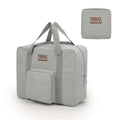 Black cube-shaped Oxford cloth travel storage bag with zip closure