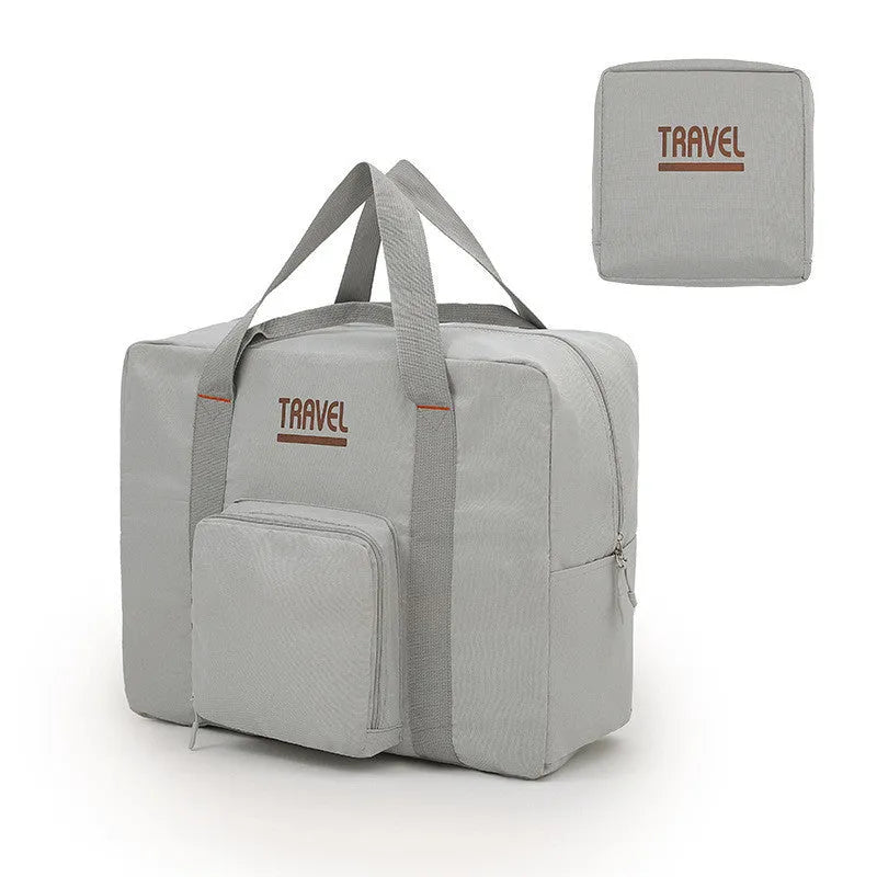 Black cube-shaped Oxford cloth travel storage bag with zip closure