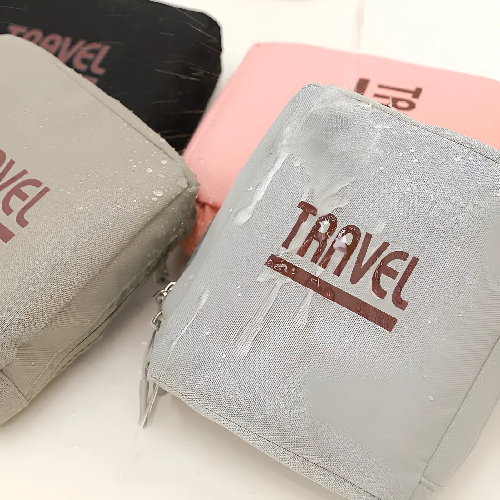 Black cube-shaped Oxford cloth travel storage bag with zip closure