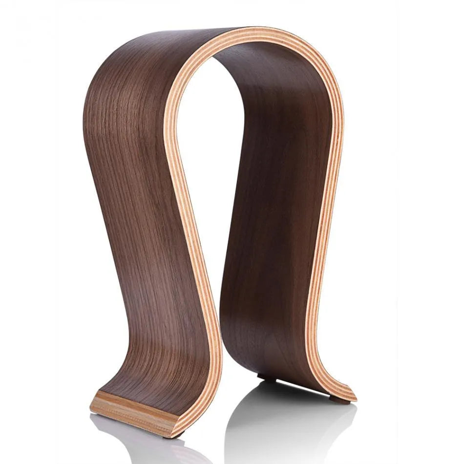 Wooden earphone holder for Bluetooth wireless headsets in brown finish on a desktop
