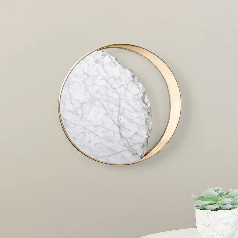 Round marble and copper LED wall lamp with eclipse art design, 25cm diameter, mounted on wall with push button switch