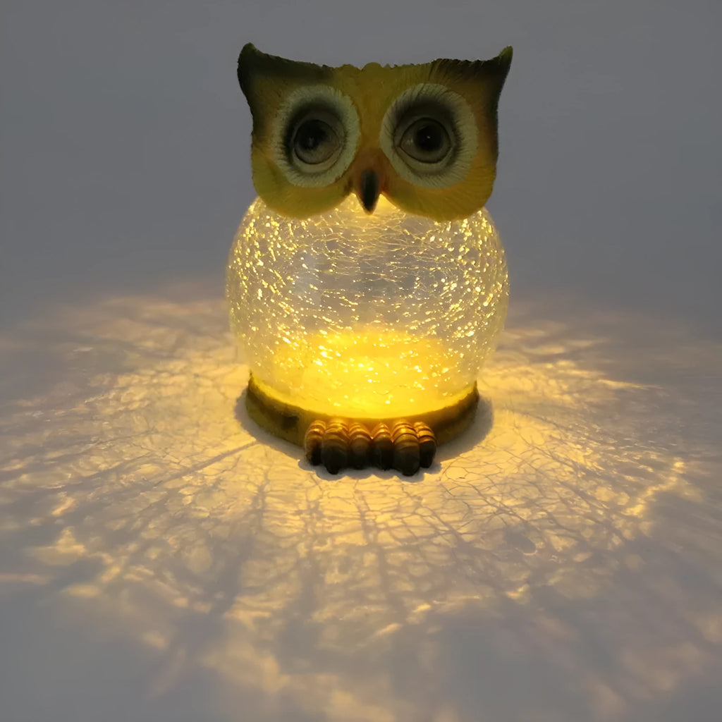 Solar owl shaped garden light with IP67 waterproof rating, 16cm high, white colour