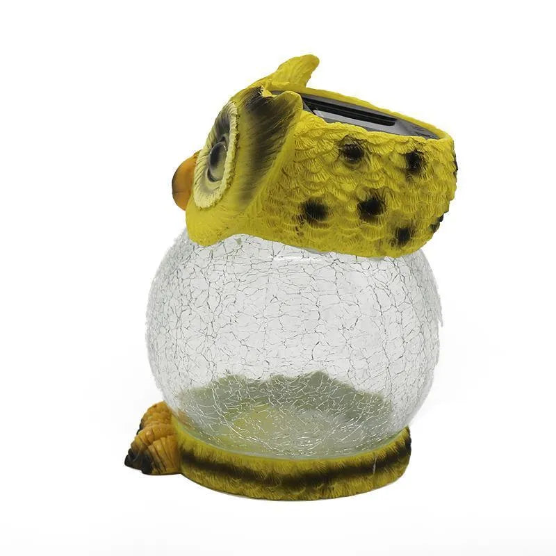 Solar owl shaped garden light with IP67 waterproof rating, 16cm high, white colour