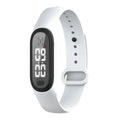 Ultrasonic electronic mosquito repellent watch bracelet in black, white, blue, and pink colours.
