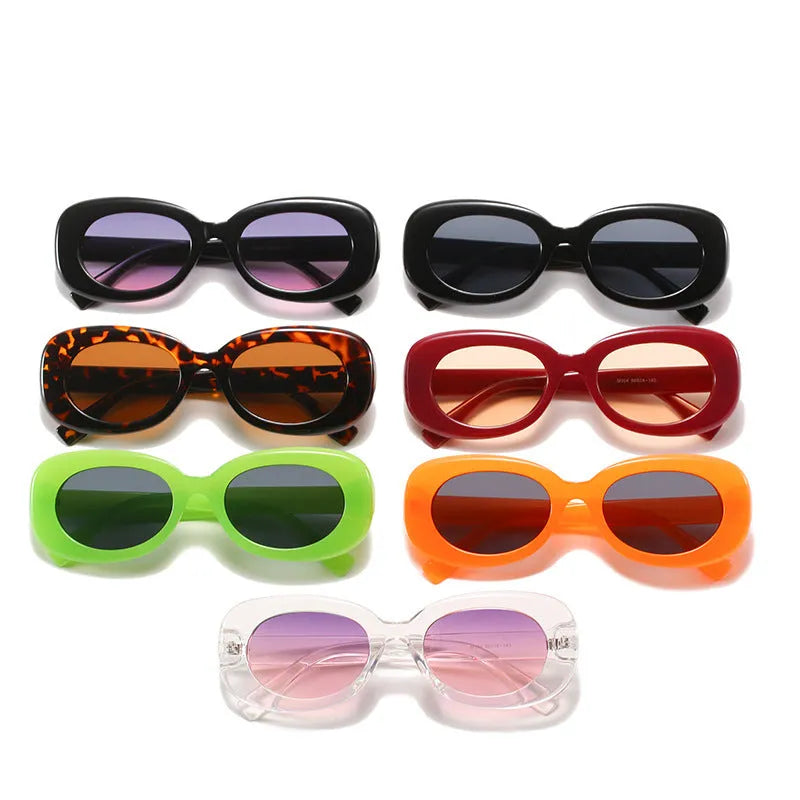 Women's oval fashion sunglasses in black with AC lens and UV400 protection PC frame