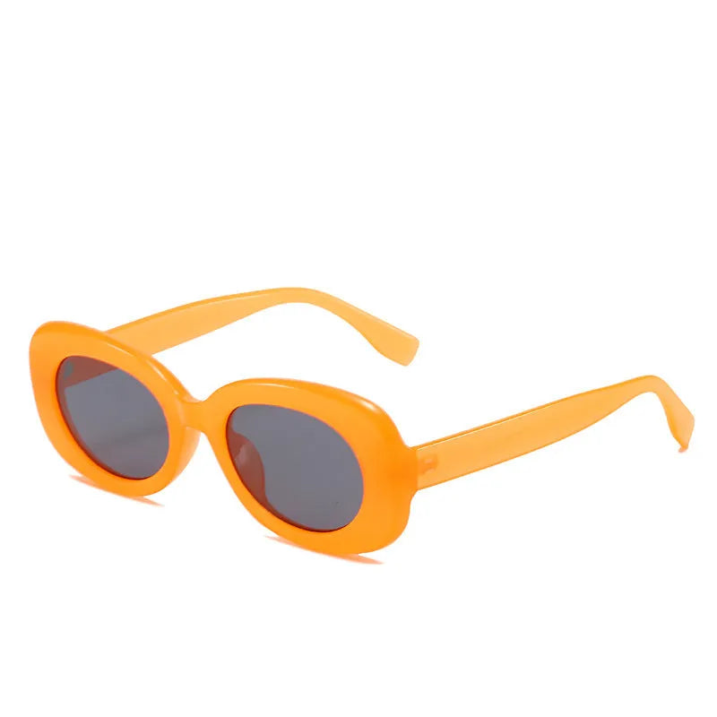 Women's oval fashion sunglasses in black with AC lens and UV400 protection PC frame