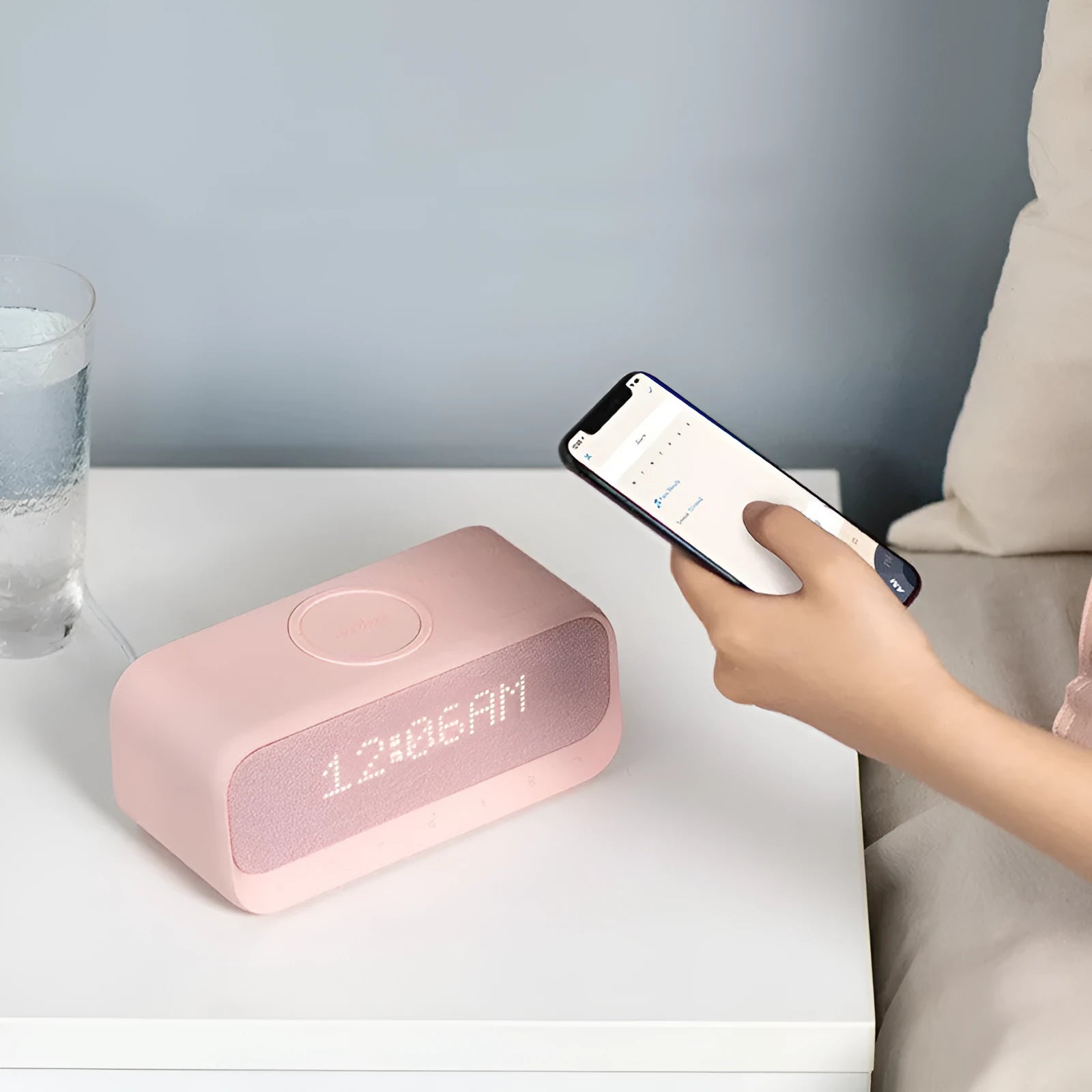 Anker Soundcore wireless charging alarm clock Bluetooth speaker in white or pink