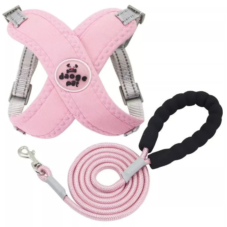 Polyester dog walking vest and hand-holding rope set shown in blue, green, pink, or yellow.