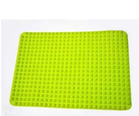 Red non-stick silicone pyramid cooking mat on a baking tray, showing grid pattern and 39.5 cm size
