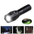 Portable mini LED zoom flashlight in black aluminium alloy body with adjustable focus 500m range