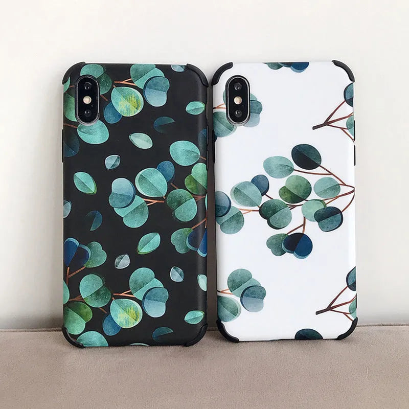 Black silicone iPhone case with a raised leaf pattern on the back.