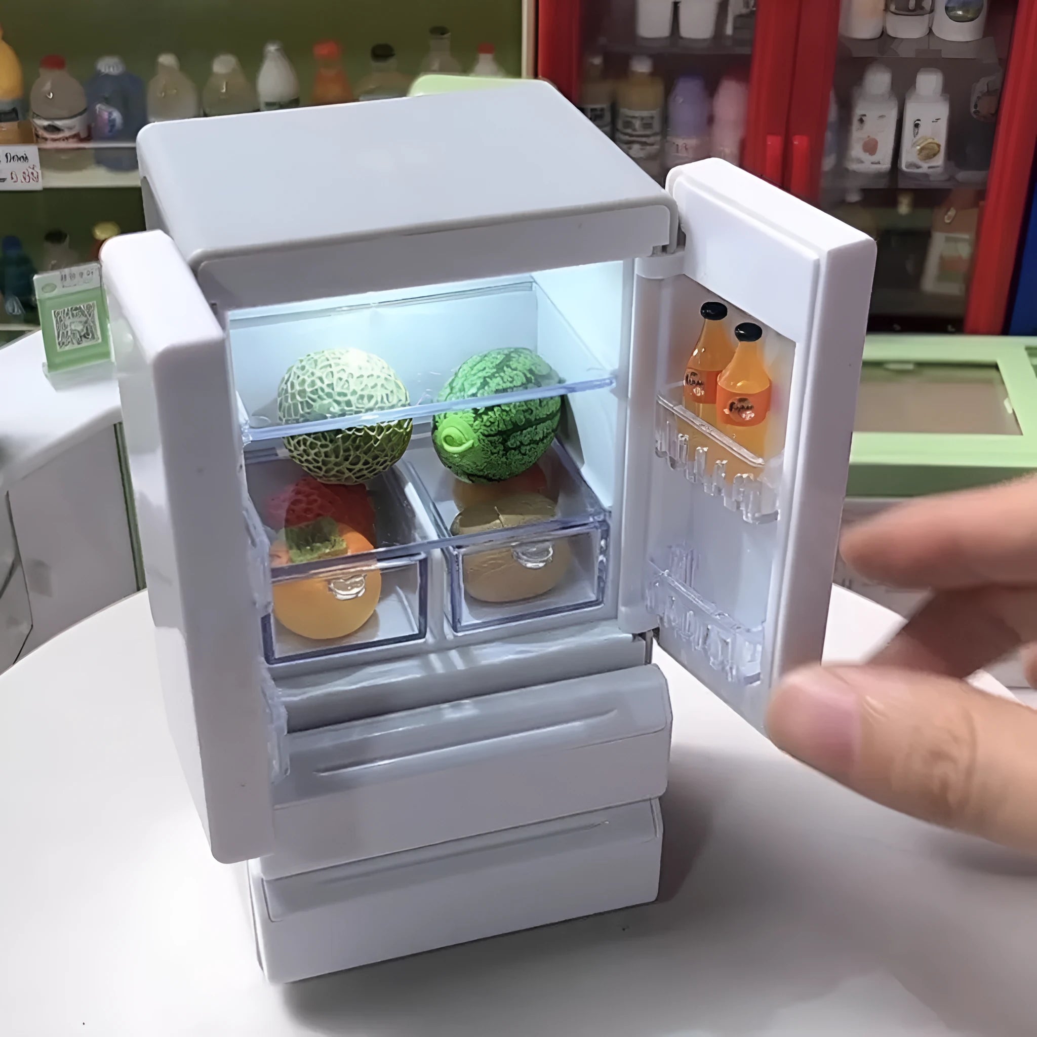 White plastic candy shop miniature model with light-up feature, dimensions 11.4cm tall