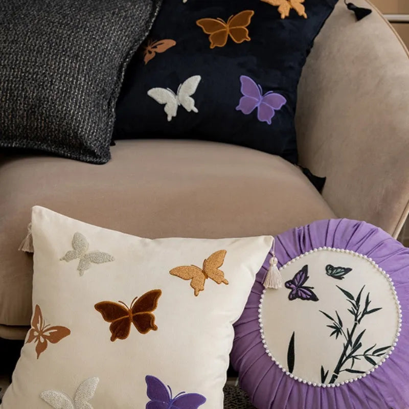 Chinese embroidery butterfly pattern cushion in beige, black, and purple colours