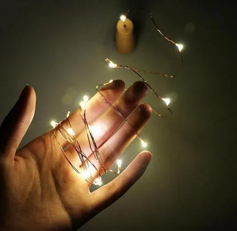 Copper wire LED string light with 20 bulbs and plastic bottle stopper for decorative lighting