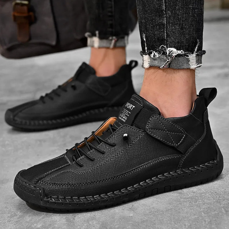 Men's mid-top Martin boot in a solid colour with elastic band and tooling stitching detail.