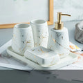 Ceramic bathroom wash set in white with decal finish, three pieces on countertop