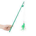 Green interactive cat toy feather wand with bell refills and feathers on a white background