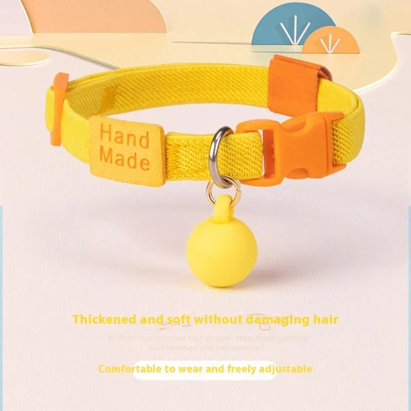 Small elastic dog collar in polyester, shown in various colours including yellow, pink and sky blue.