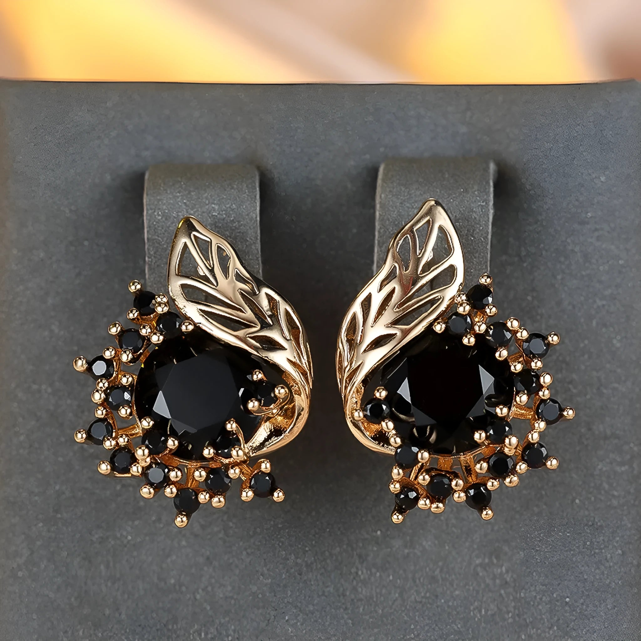 Round floral feather earrings with zircon stone centre in champagne gold finish, available in six coloured diamond options