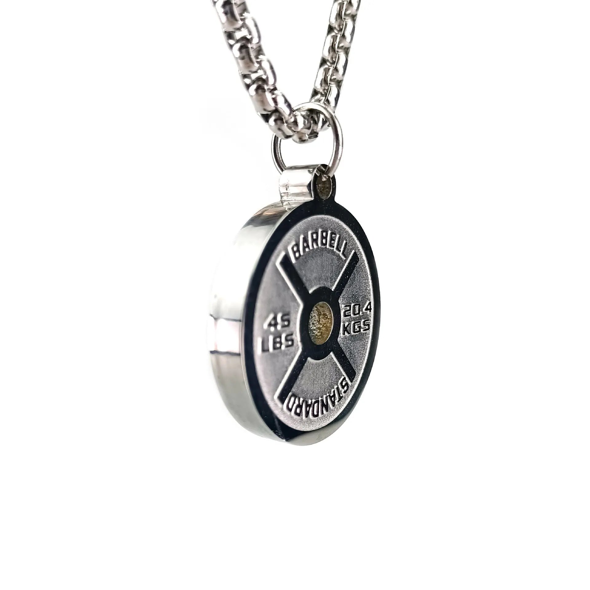 Polished stainless steel barbell disc pendant on a 60cm chain, showing geometric fitness jewellery design.
