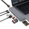 USB-C expansion hub with dual connectors for 2015-2018 MacBook Pro showing eight interface ports
