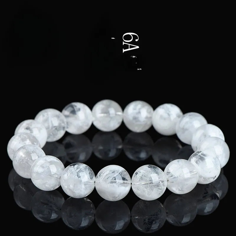 Crystal bracelet with blizzard snowflake pattern beads featuring Ruyi and Xiangyun symbols in geometric shape