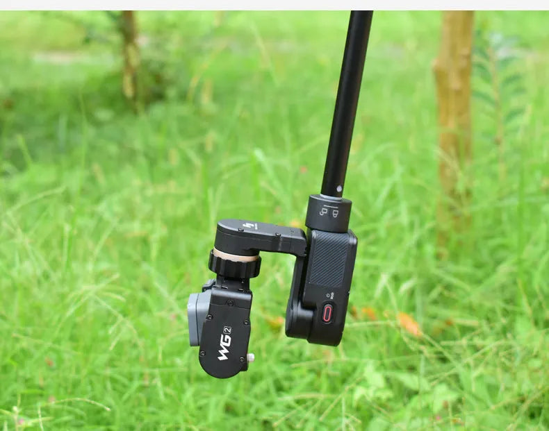 Black retractable selfie stick extended to show telescopic sections for phone photography.