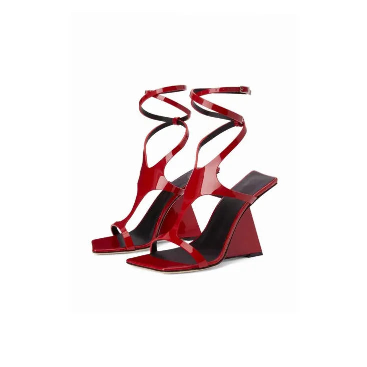 Women's black heel sandals with 9.5cm heel and button fastening, square toe design.