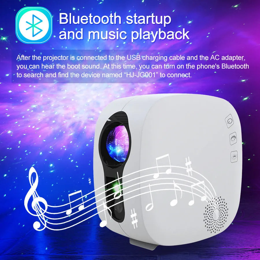Laser starry sky projection lamp with colourful nebula moon effect and Bluetooth music playing, black unit on a desk