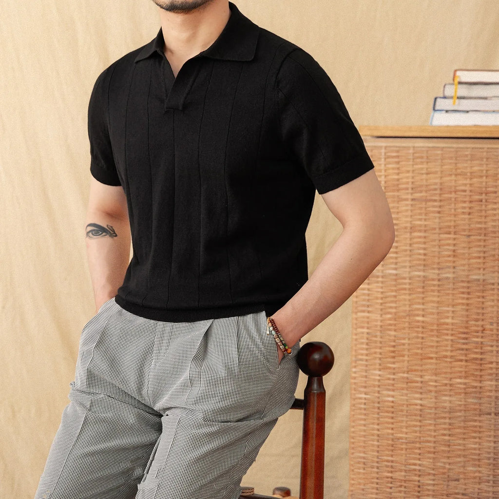 Men's purple short sleeve polo top with sunken stripe knit and a seagull collar.