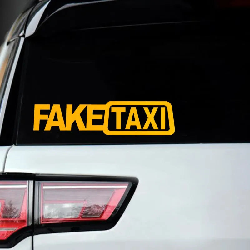Black waterproof PET car sticker with white FAKE TAXI text, measuring 20 cm by 8 cm.