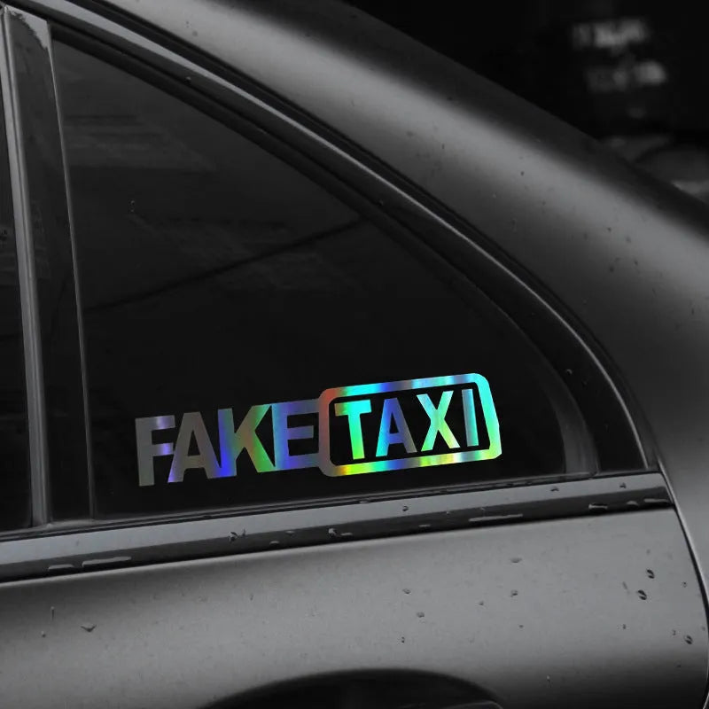 Black waterproof PET car sticker with white FAKE TAXI text, measuring 20 cm by 8 cm.