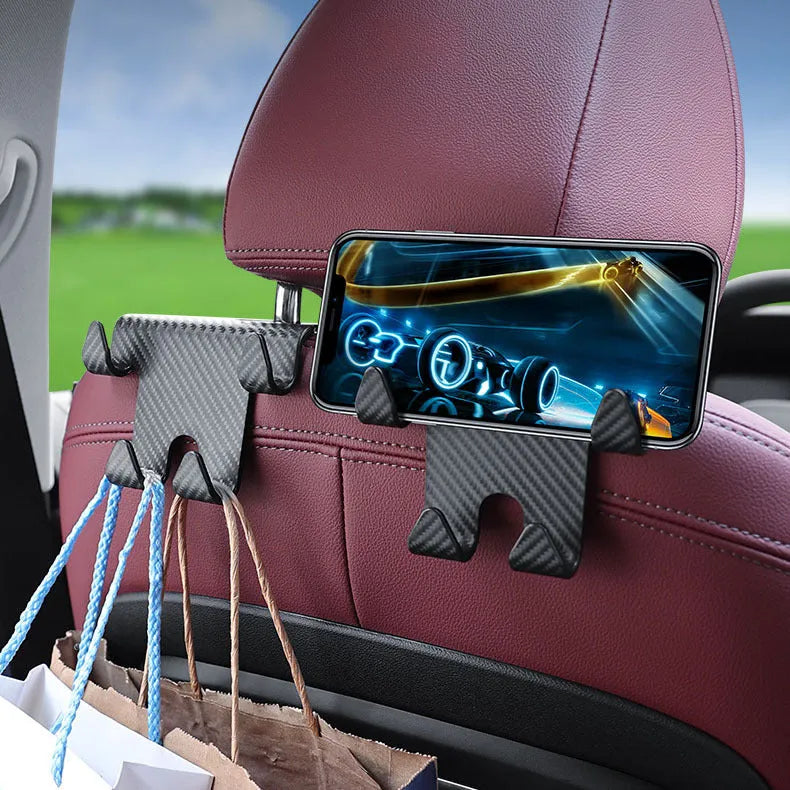 Black ABS plastic car seat back hook with integrated mobile phone holder bracket.