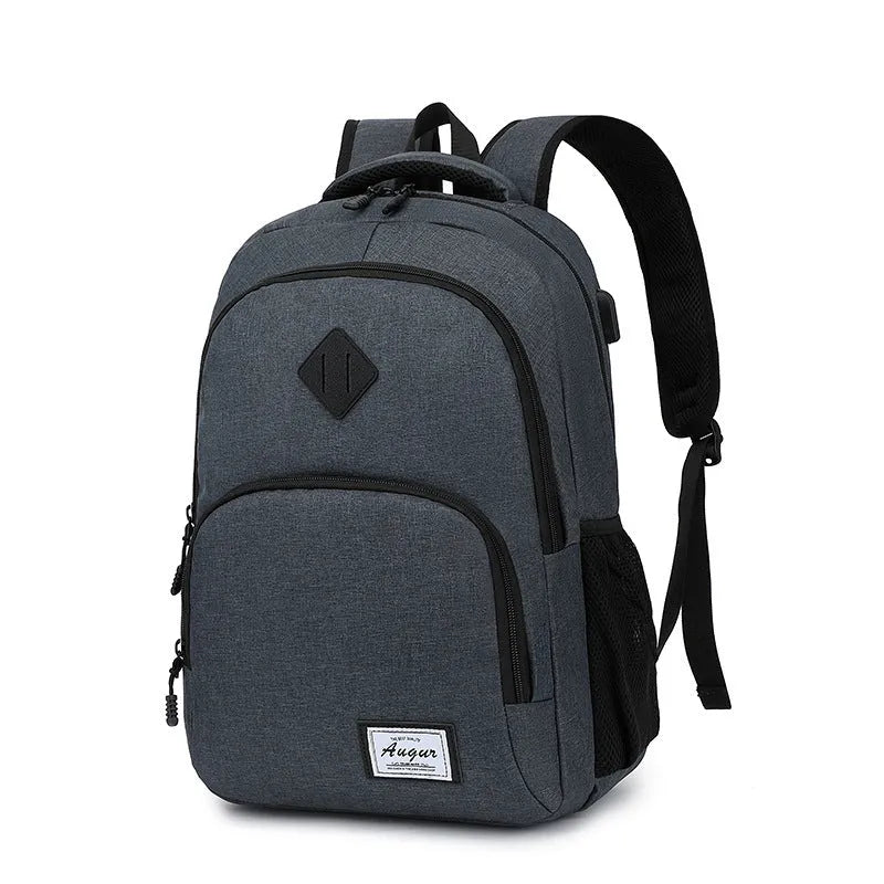 Gray USB charging backpack with luggage strap on a trolley case, showing charging port.