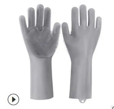 Silicone heat-resistant cleaning brush scrubbing gloves in blue, 357x165mm, on a kitchen counter
