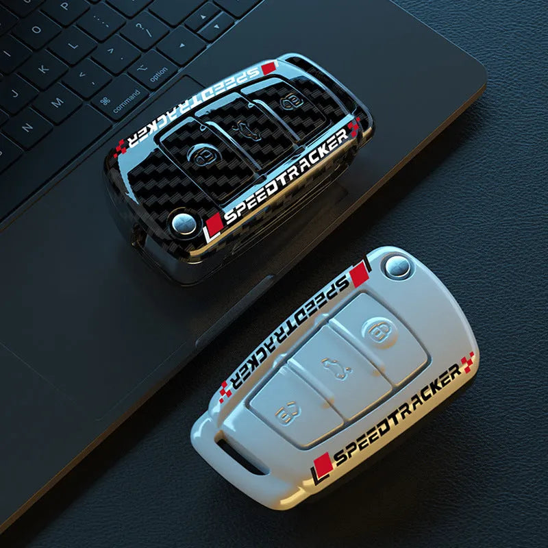 Carbon fibre style car key cover with mirror finish in carbon and white colour options