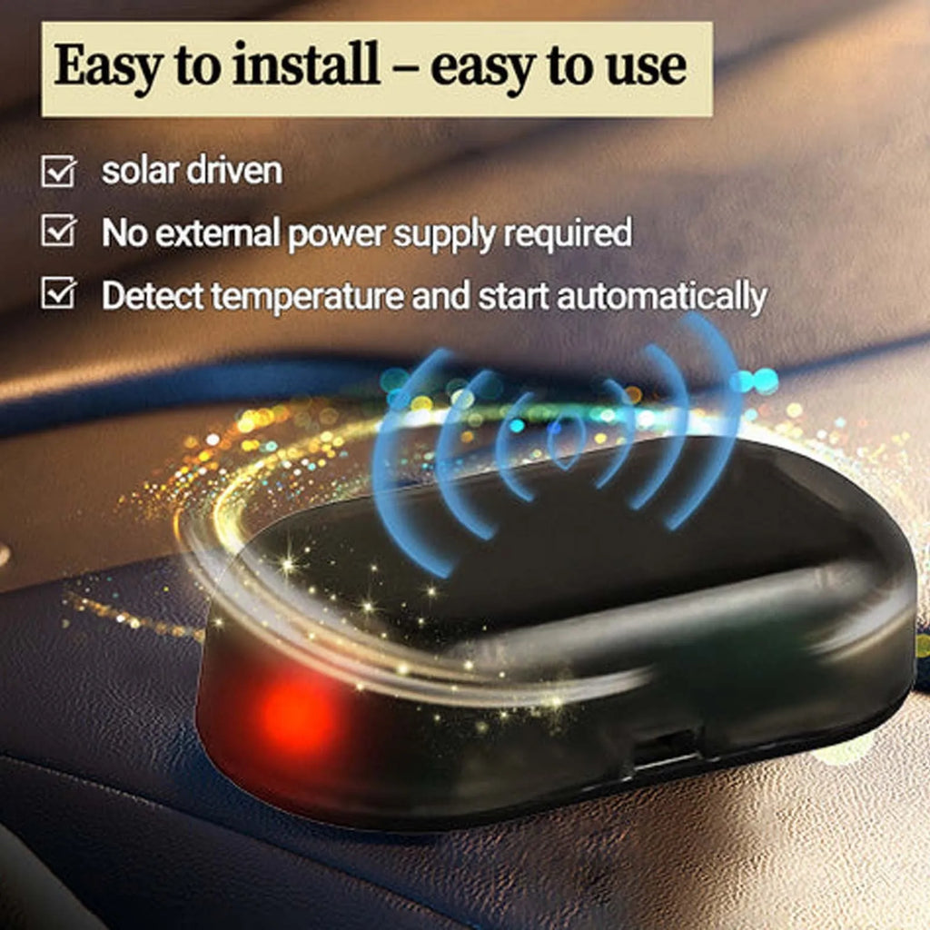 Black car snow removal tool with special glass deicing technology, 5 x 2.6 x 1.5 cm, placed on a car dashboard
