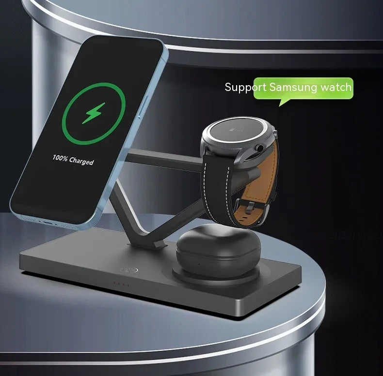 Black and white five-in-one wireless charging night lamp with magnetic phone bracket and circular base.