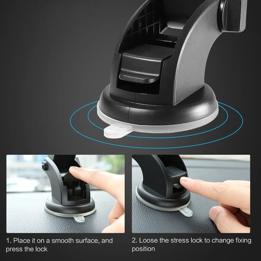 Black telescopic car dashboard phone holder with extended arm and gel suction cup mounted on a textured surface.