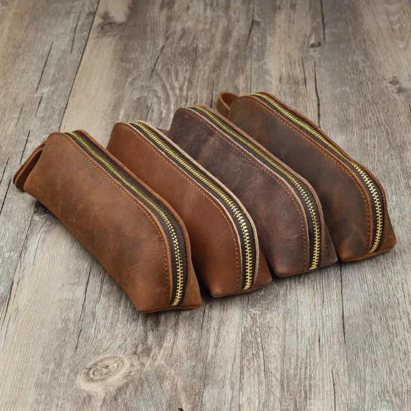 Genuine cowhide leather pencil case with zipper closure showing black colour option